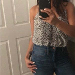 Spaghetti strap black and white designed top.